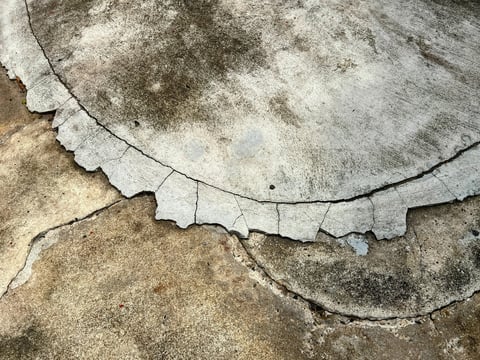 Cracked concrete patio before