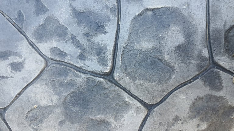 Dark stone pattern concrete walkway